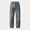Men's denim jeans by FJØRNA with floral pattern, stylish casual pants featuring classic denim fabric and floral design.