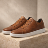 FJØRNA men's trainers shoes featuring a stylish athletic design with breathable material and supportive sole.