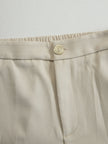FJØRNA khaki belted waist two-piece trouser set featuring tailored pants and matching top, stylish and versatile for casual or office wear.