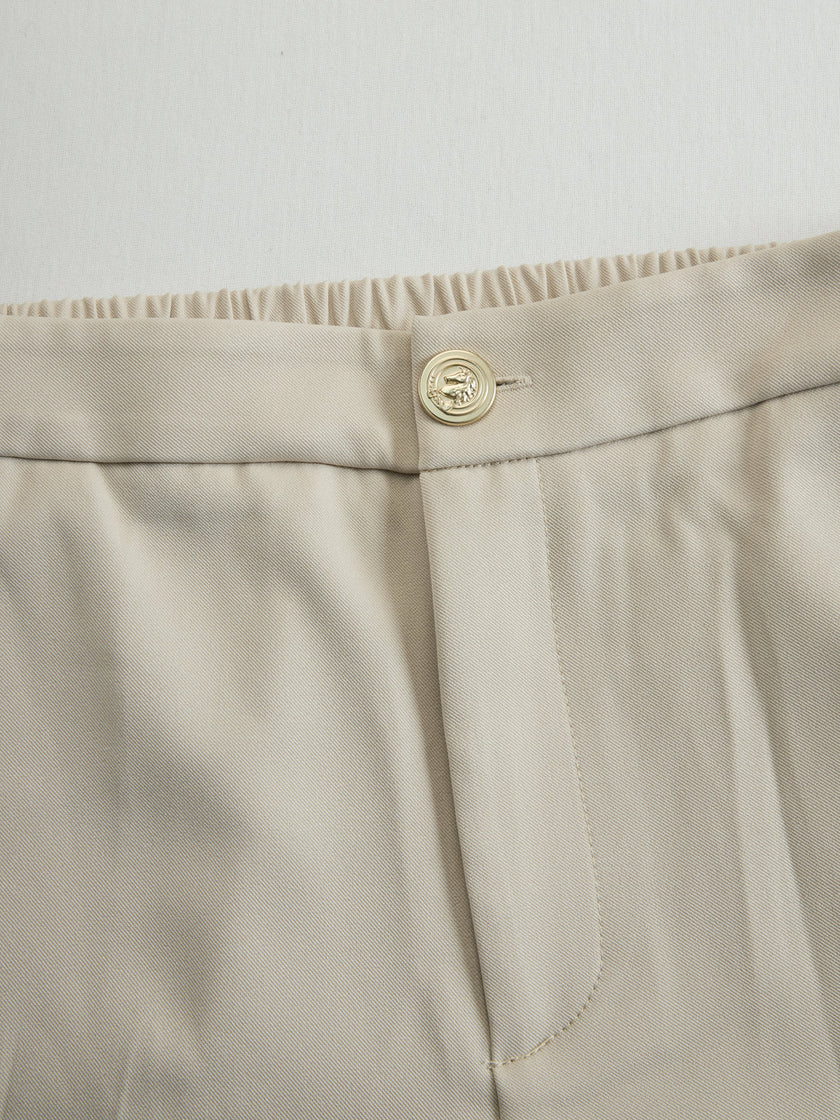 FJØRNA khaki belted waist two-piece trouser set featuring tailored pants and matching top, stylish and versatile for casual or office wear.
