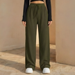 FJØRNA women's wide leg trousers with elastic waist and pleated design, shown in a natural fabric and relaxed fit.