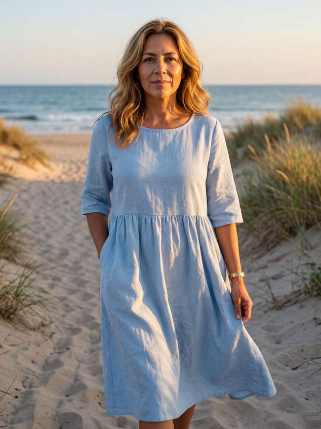Flowy summer maxi dress for women by FJØRNA featuring pockets and casual, breezy design, perfect for warm weather.