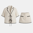 Women's ivory linen blend co-ord shirt and skirt set by FJØRNA, featuring a stylish matching top and skirt ensemble.