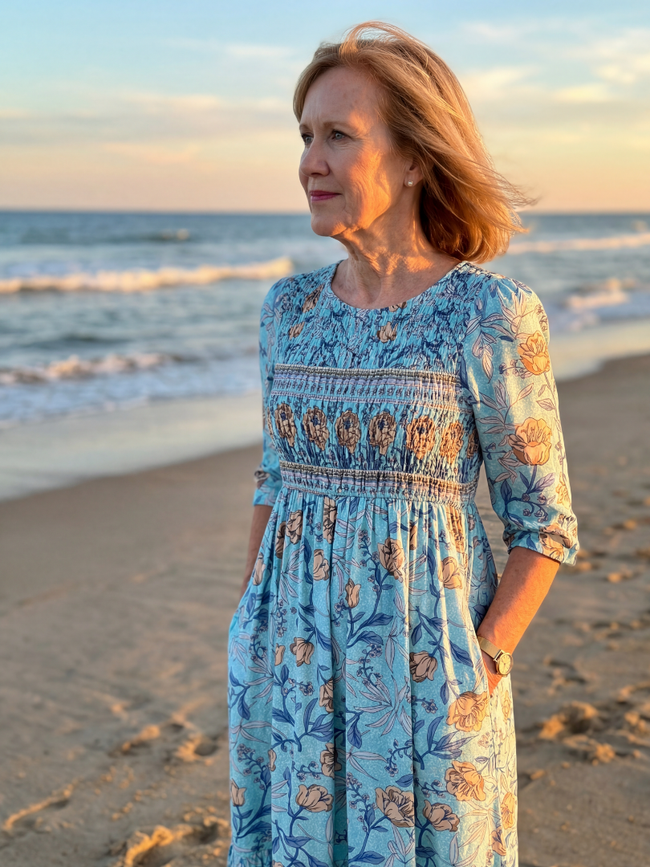 FJØRNA women's floral summer midi dress with short sleeves, wrap style, flowy fabric, perfect for warm weather.