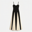 FJØRNA women's spaghetti strap contrast color maxi dress with flowing fabric and sleeveless design, perfect for summer wear.