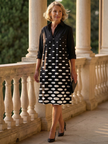 FJØRNA women's elegant polka dot dress with pockets, stylish and comfortable for casual or semi-formal occasions.