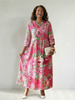 FJØRNA women's floral summer midi dress with long sleeves, flowy fabric, perfect for warm-weather occasions.