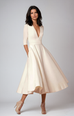Navy FJØRNA wedding guest flared midi dress for women, elegant and stylish for wedding occasions, with a fitted bodice and flowing skirt
