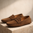 Men's FJØRNA loafers shoes in classic brown leather with sleek design and slip-on style, suitable for casual or formal wear.