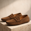 Men's FJØRNA loafers shoes in classic brown leather with sleek design and slip-on style, suitable for casual or formal wear.
