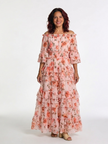 FJØRNA women's floral ruffle summer maxi dress with flowing fabric and sleeveless design, perfect for warm weather occasions.