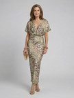 FJØRNA women's summer midi dress with a colorful print and short sleeves, perfect for warm weather and casual occasions.