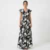Women's floral print V-neck summer maxi dress by FJØRNA featuring a flowing fabric and vibrant floral pattern.