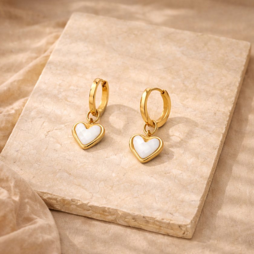 FJØRNA white quartz heart huggie earrings for women with gold accents, delicate jewelry accessory