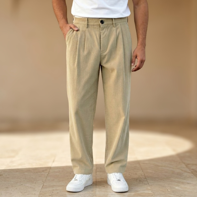 Men's FJØRNA straight leg corduroy trousers, casual pants with a relaxed fit and textured fabric, shown in a neutral color.