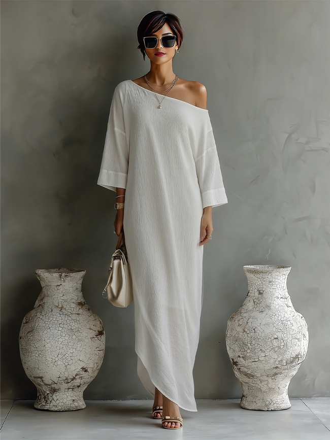 Women's ivory white cotton-linen blend mini dress by FJØRNA, featuring a sleeveless design and relaxed fit.