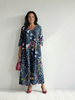 FJØRNA women's floral summer midi dress with long sleeves and wrap design, perfect for warm-weather occasions.