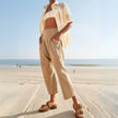 Women’s wide-leg denim jeans by FJØRNA, showcasing the relaxed fit and classic blue denim fabric.