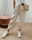 FJØRNA lightweight summer women's trousers with high waist, straight leg fit, and front pockets, ideal for casual wear.