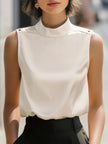 Ivory satin high-neck sleeveless blouse for women by FJØRNA, stylish top with elegant satin fabric and sleeveless design.