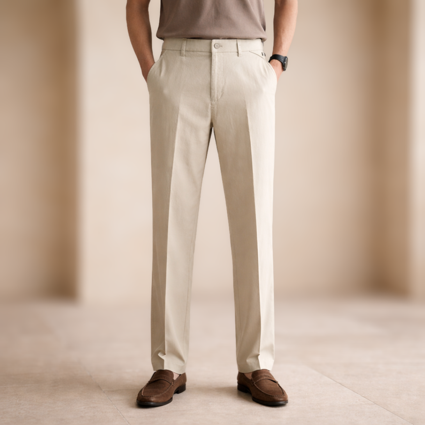 FJØRNA men's straight leg trousers with elastic waistband, made from comfortable fabric, suitable for casual or office wear.