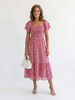 FJØRNA women's floral summer midi dress with puff sleeves and wrap design, perfect for warm-weather occasions.