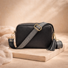 FJØRNA leather chevron strap genuine crossbody bag for women, featuring a sleek design and adjustable strap.