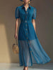 Blue denim V-neck short-sleeved organza maxi dress for women by FJØRNA, featuring a flowing silhouette and elegant design.