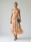 FJØRNA women's summer midi dress with halter neck, sleeveless, flowy lightweight fabric, perfect for warm weather.