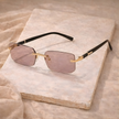Unisex retro sunglasses by FJØRNA with round frames and tinted lenses, stylish accessory for men and women.