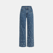 Women’s relaxed fit baggy denim jeans by FJØRNA, showing the light-wash, high-waisted style with classic five-pocket design.