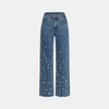 Women’s relaxed fit baggy denim jeans by FJØRNA, showing the light-wash, high-waisted style with classic five-pocket design.