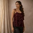 FJØRNA men's sequin top, stylish women’s top with shiny sequin embellishments, perfect for trendy evening wear.