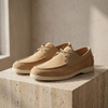 Red lace-up shoes for men by FJØRNA, stylish leather footwear with intricate lace detailing and classic design.