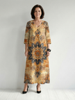 FJØRNA women's summer midi dress with floral pattern, long sleeves, flowy and breathable fabric, ideal for warm weather.