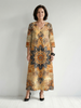 FJØRNA women's summer midi dress with floral pattern, long sleeves, flowy and breathable fabric, ideal for warm weather.