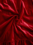 Red velvet pleated ruffled long sleeve blouse by FJØRNA, shown with detailed ruffle accents and elegant pleats on the fabric.