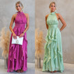 FJØRNA elegant women's maxi dress with halter neck and ruffle details, flowing fabric, and a stylish design for special occasions