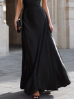 FJØRNA one-shoulder draped high-neck maxi dress in flowing fabric, stylish evening dress with elegant silhouette.