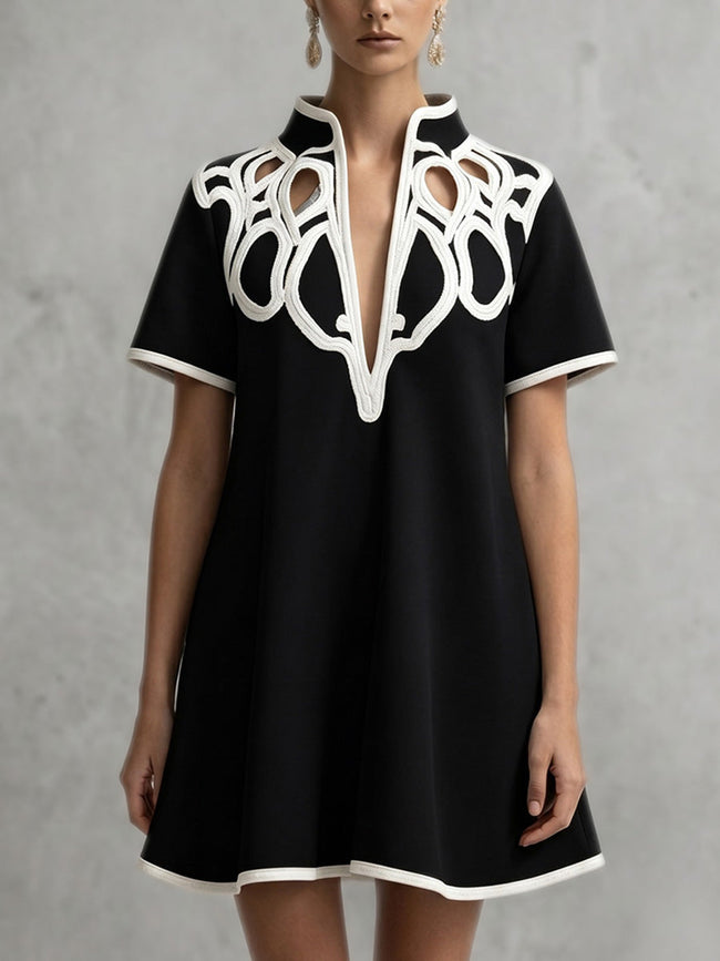 FJØRNA white A-line loose contrast color V-neck mini dress featuring a relaxed fit and stylish design.