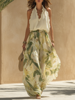 FJØRNA Lysandra white dress with elegant fluid silhouette, perfect for formal occasions or stylish events.