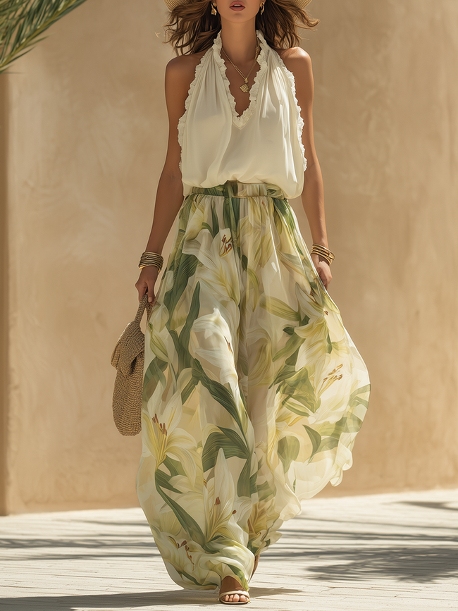 FJØRNA Lysandra white dress with elegant fluid silhouette, perfect for formal occasions or stylish events.