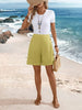 FJØRNA women's lightweight summer shorts with relaxed fit, elastic waist, and breathable fabric for comfortable warm-weather wear.