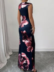 FJØRNA white bodycon sleeveless maxi dress with contrast color flower print and round neckline, perfect for summer wear.