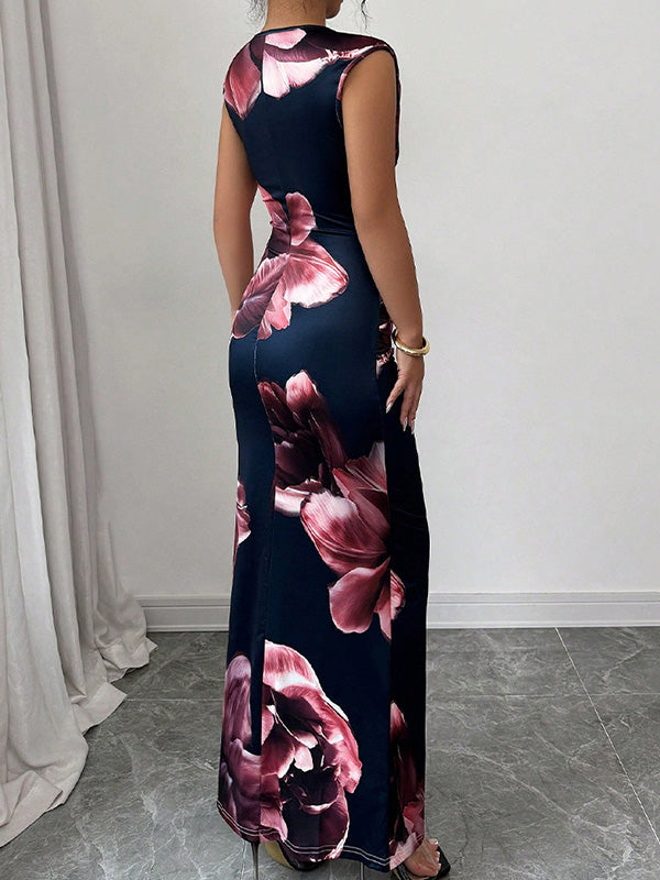 FJØRNA white bodycon sleeveless maxi dress with contrast color flower print and round neckline, perfect for summer wear.