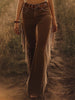 FJØRNA brown Western fringe flared jeans for women, showcasing the stylish flared cut and fringe details on denim pants.