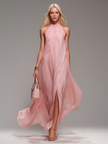 FJØRNA chiffon halter neck maxi dress with flowing fabric, perfect for evening wear, shown in a comfortable, elegant silhouette.