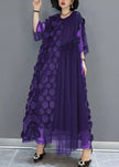 FJØRNA black tulle evening dress with o-neck, asymmetrical hem, and half sleeves, perfect for parties and special occasions.