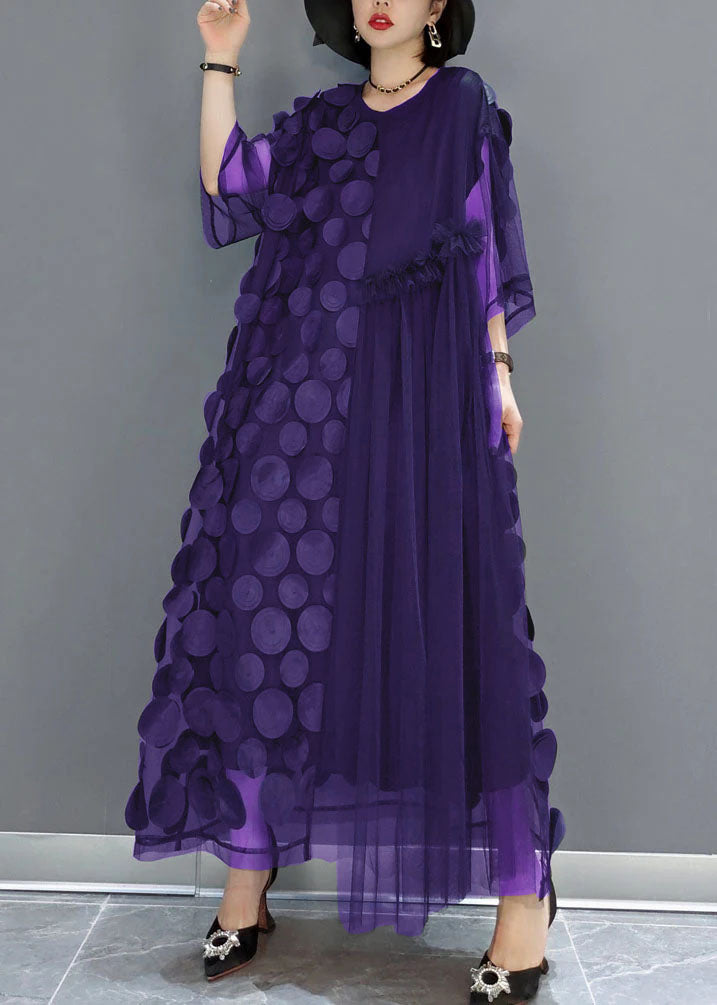 FJØRNA black tulle evening dress with o-neck, asymmetrical hem, and half sleeves, perfect for parties and special occasions.