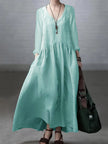 Light beige FJØRNA cotton and linen V-neck casual dress with a loose fit, perfect for casual wear or weddings.